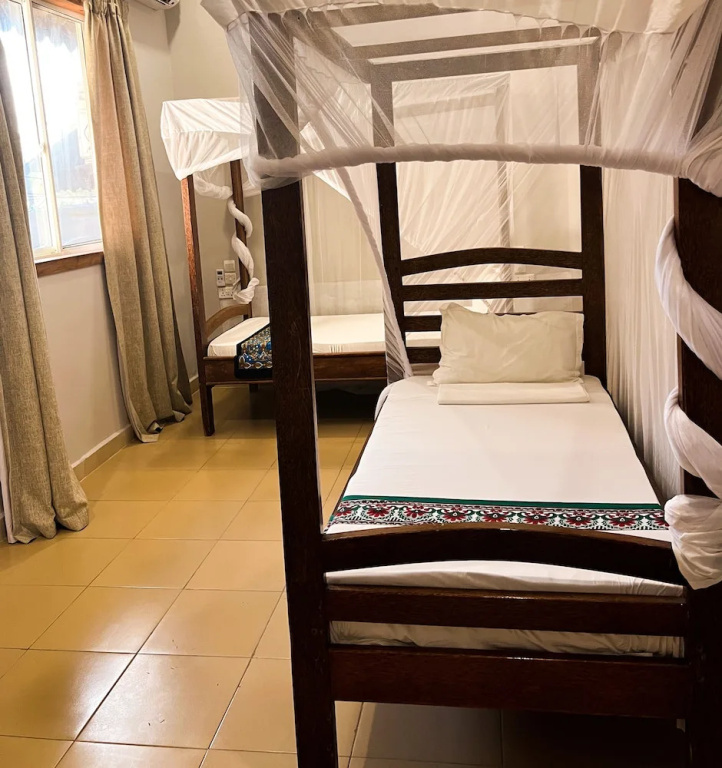 2 Bedrooms Deluxe Quadruple room with partial ocean view