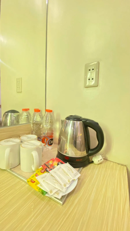 The Amrani Syariah Hotel - Chambres
