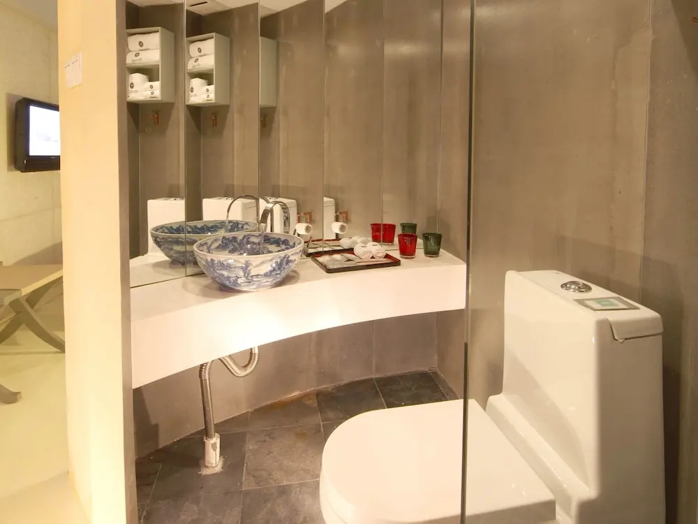 China Community Art Habitat Hotel - Chambres