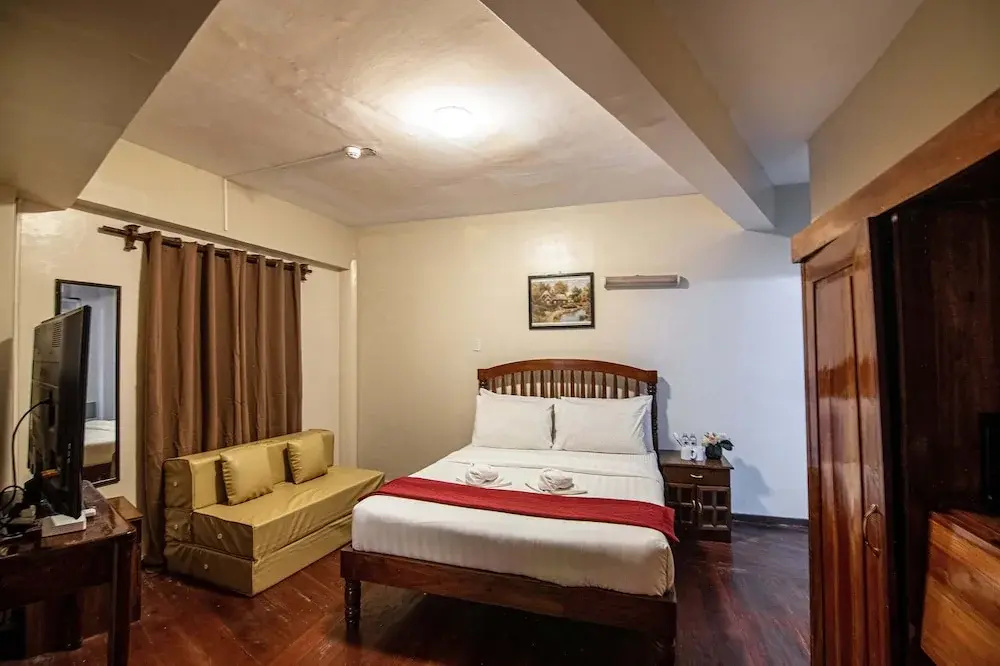 Kiwi Hotel - Chambres