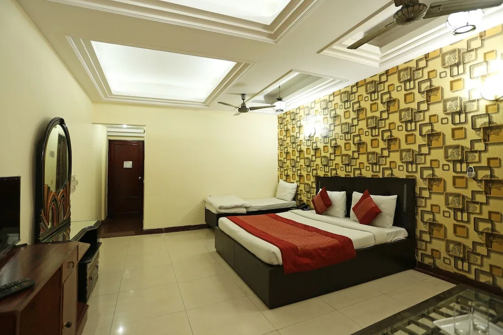 OYO 7844 Hotel Welcome Plaza - Chambres