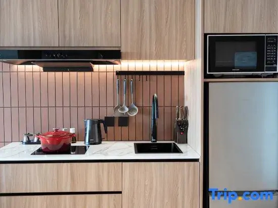 Jingguang Center Apartment Hotel - Chambres