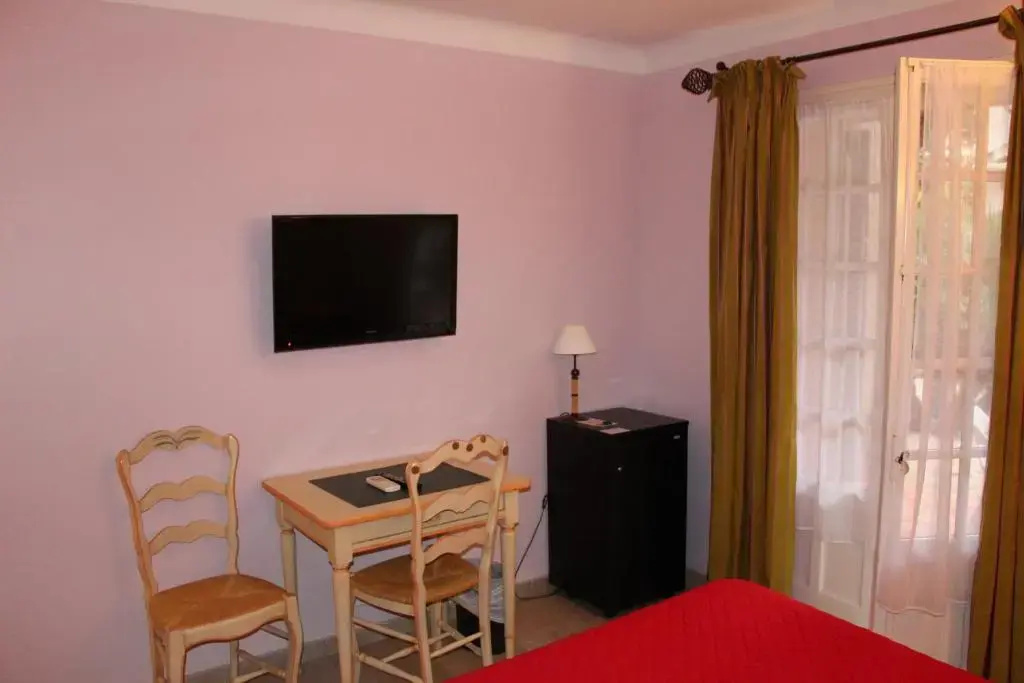 Htel Les Palmiers - Chambres