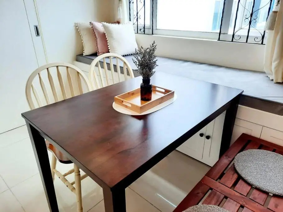 1 BR Cozy Farmhouse-Style Condo with Balcony & Taal View at Wind Residences