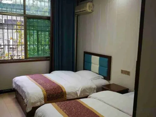 Enshi Xueyuan Hotel