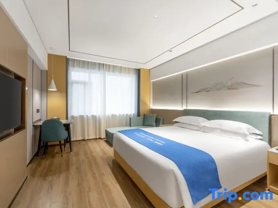 Xinyue Hotel - Chambres