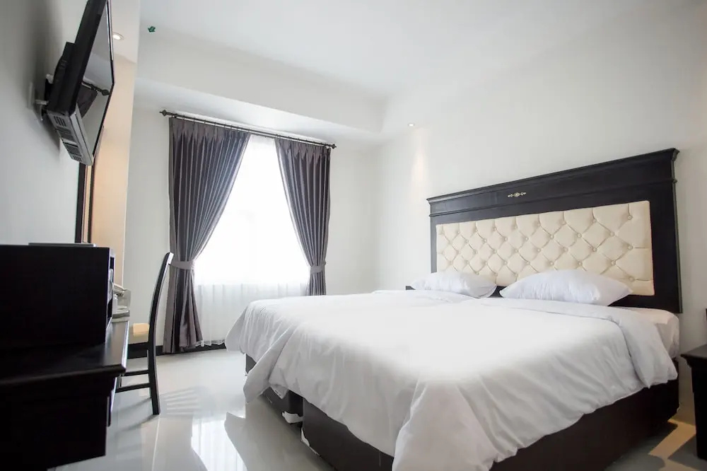 Same Hotel Malang - Chambres
