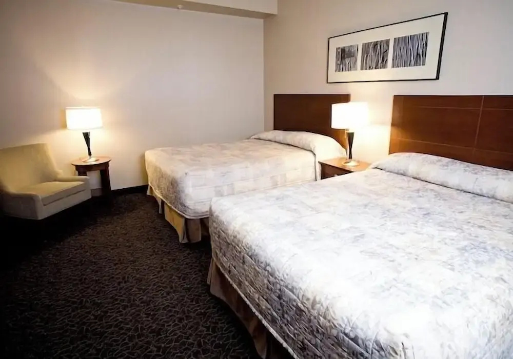 Heritage Inn & Suites - Chambres