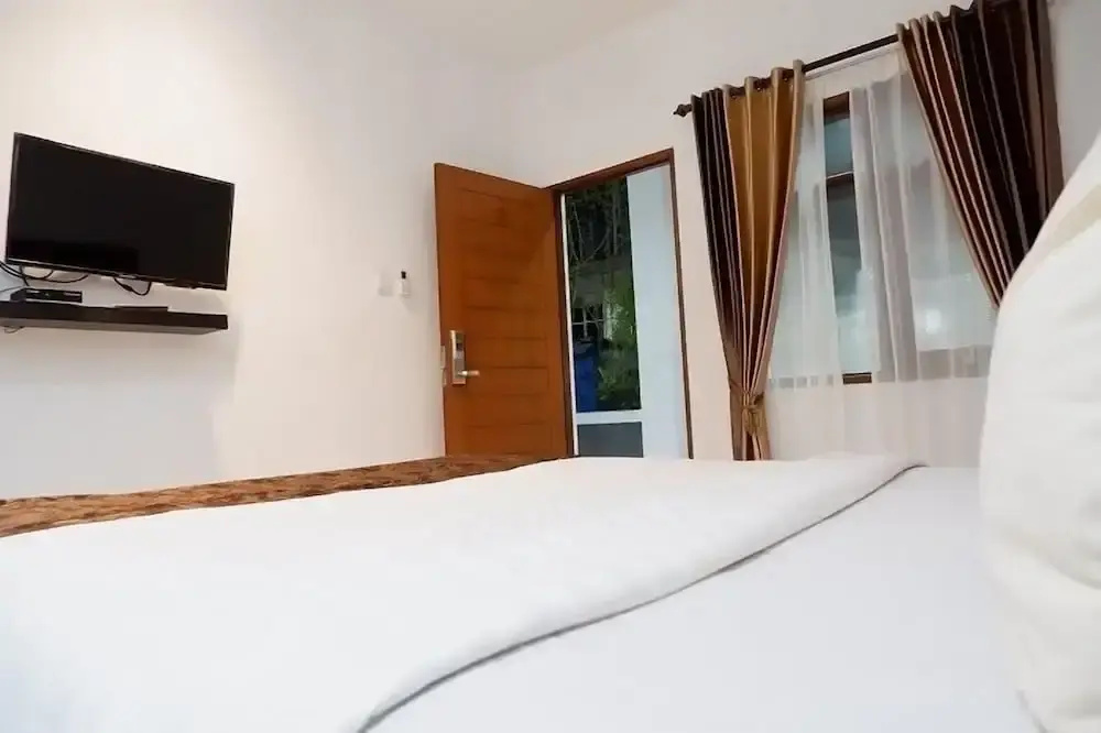 Netral Hotel - Chambres
