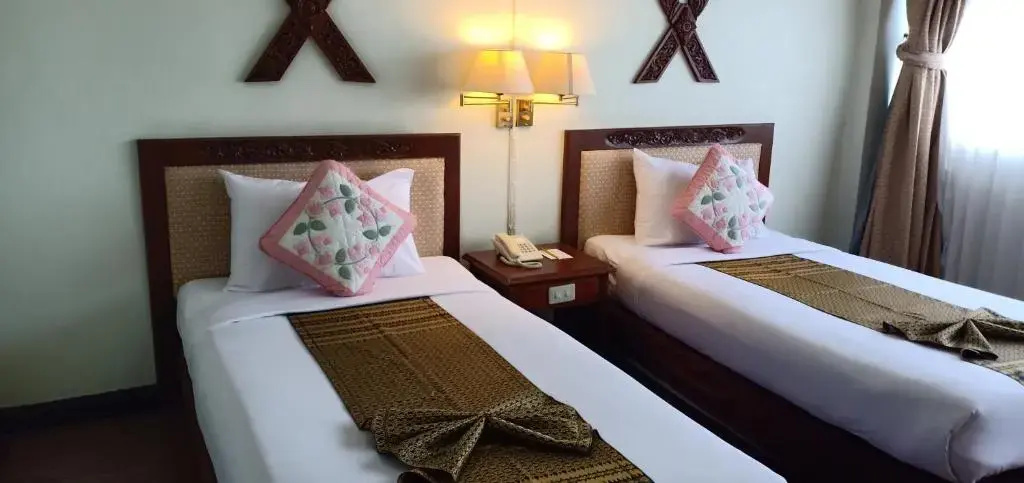 Mae Yom Palace Hotel - Chambres