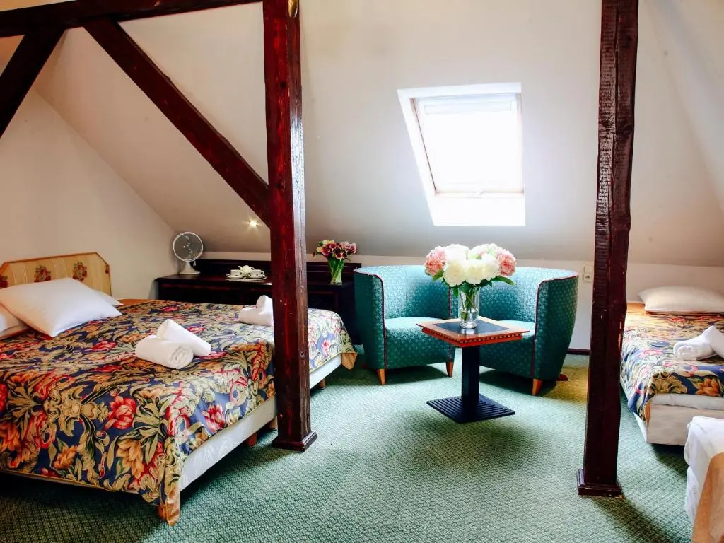 Aparthotel Miodosytnia - Chambres