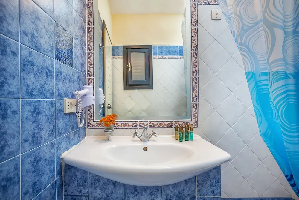 Atrium Hotel - Chambres