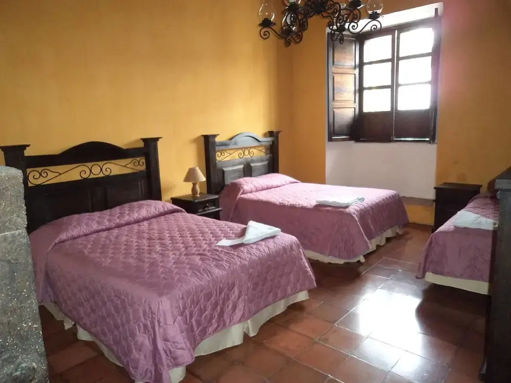 Chez Juanca Hotel Cafe - Chambres