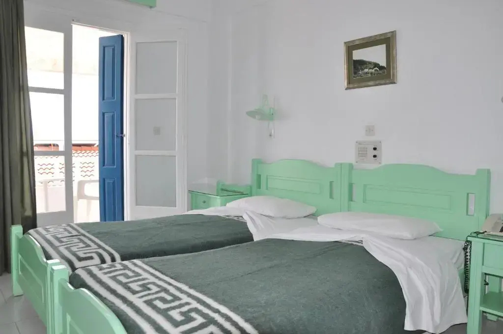 Remezzo Hotel & Studios - Chambres