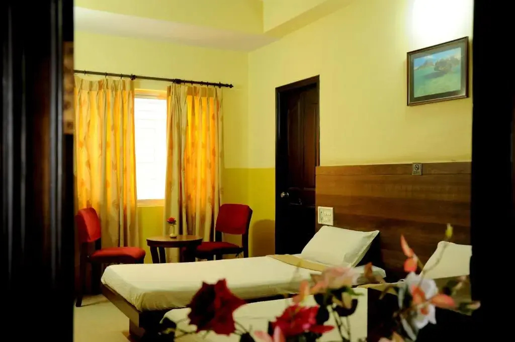 Suvarna Residency - Chambres