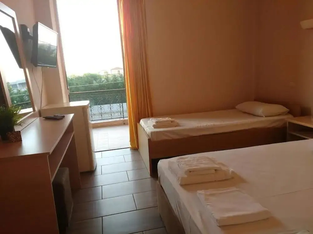 Economy Quadruple room with balcony and with garden view