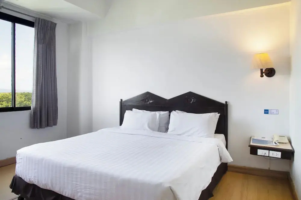 Phrae Nakara Hotel - Chambres