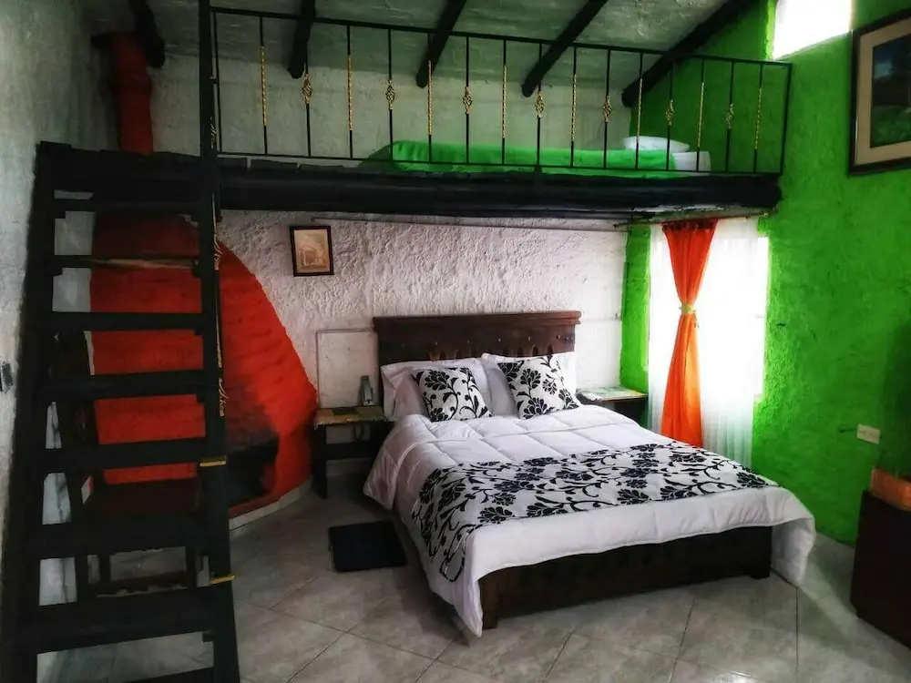 Standard Triple room with garden view