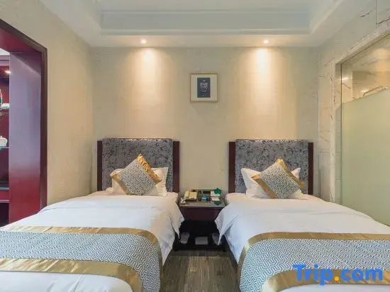 Yi Long Hotel - Chambres