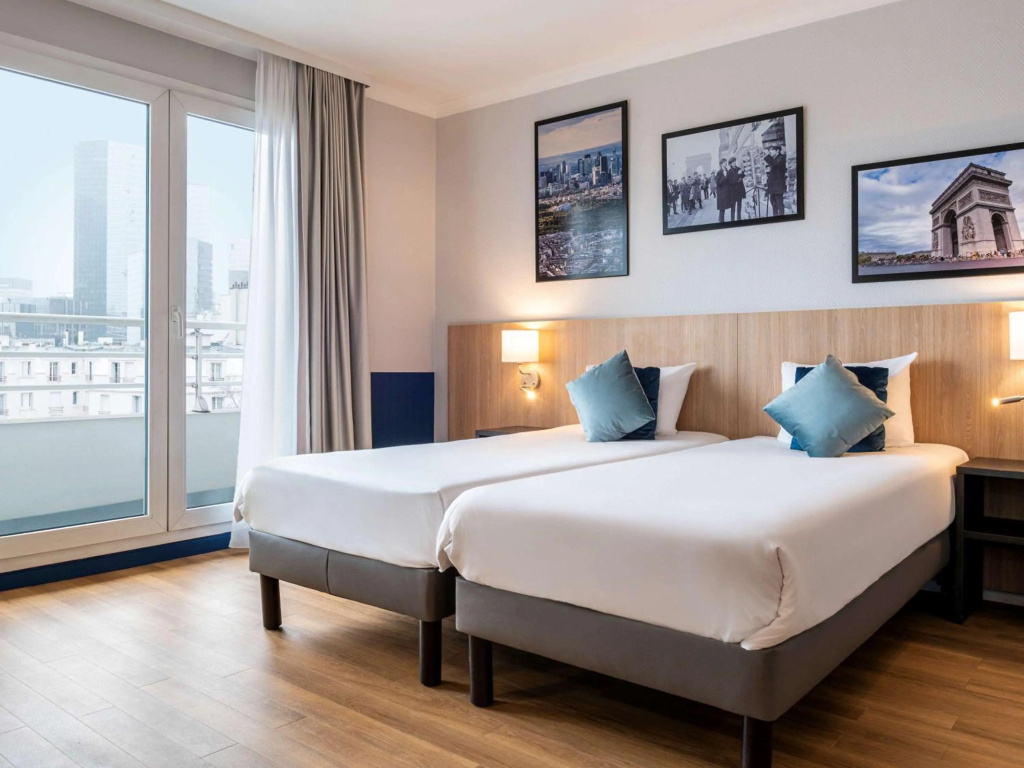 Отель Aparthotel Adagio La Defense Kleber в Курбевуе