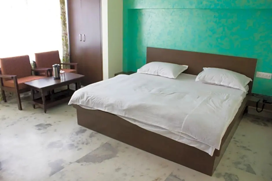 Hotel Holiday Home - Chambres