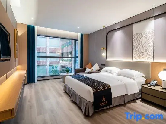 Huagang Hotel - Chambres