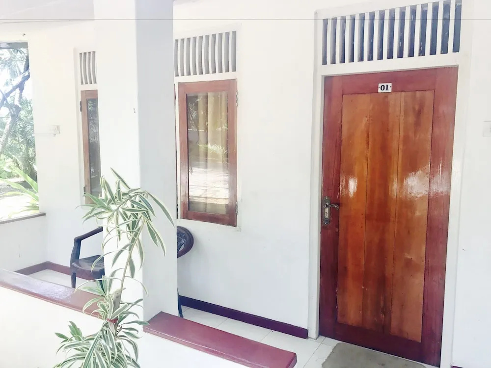 Palm Grove Holiday Inn - Chambres