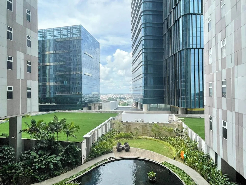 Wooden Accents 1Br At Podomoro City Deli Medan Apartment