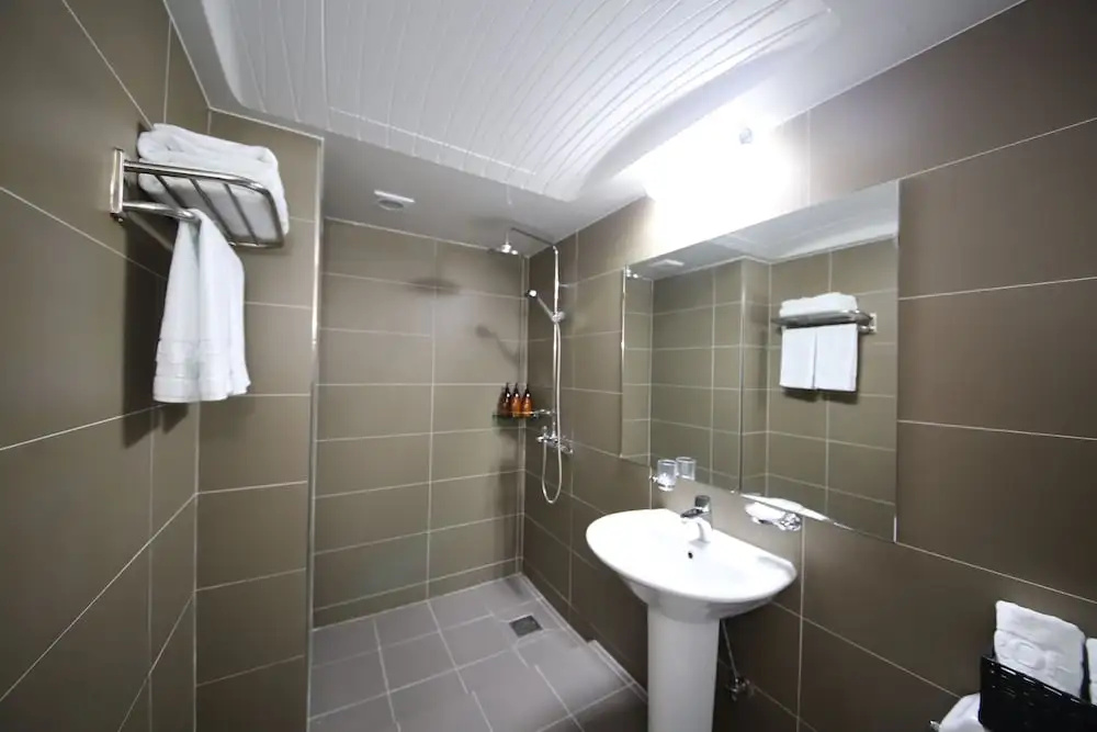 Hotel Aroha - Chambres