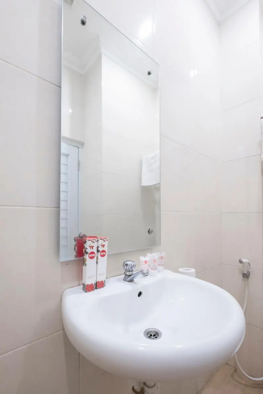 RedDoorz Plus @ Grand Pacifik Hotel Makassar - Chambres