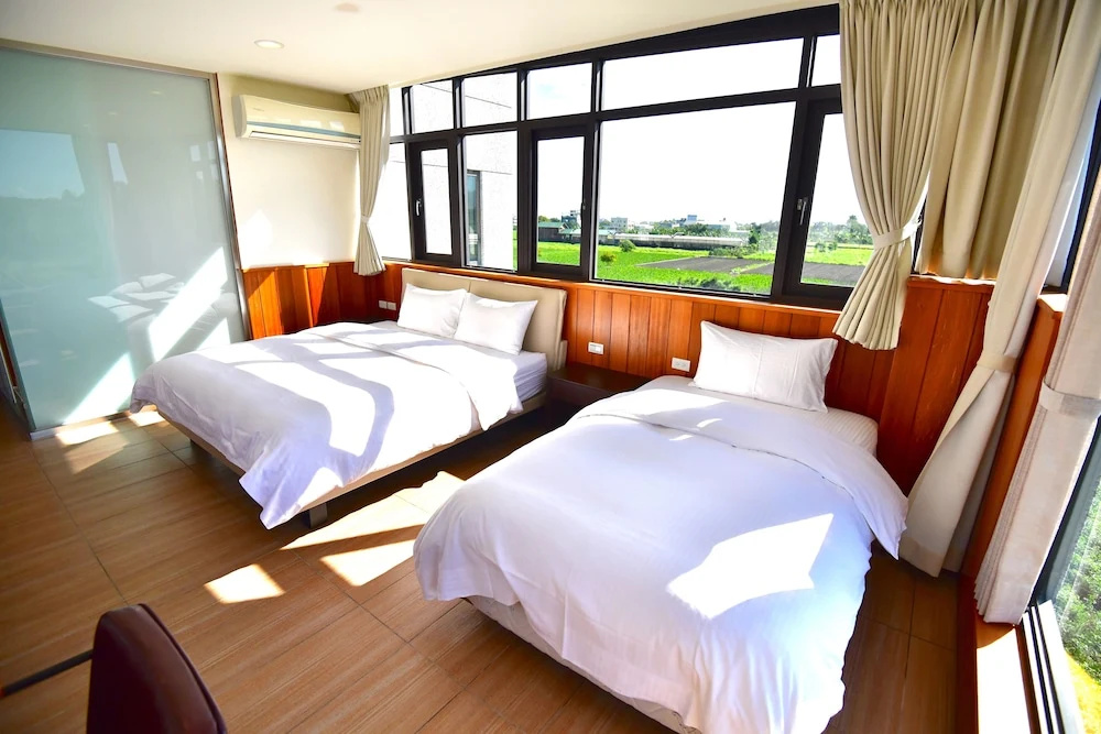 Standard Triple room with balcony and with garden view