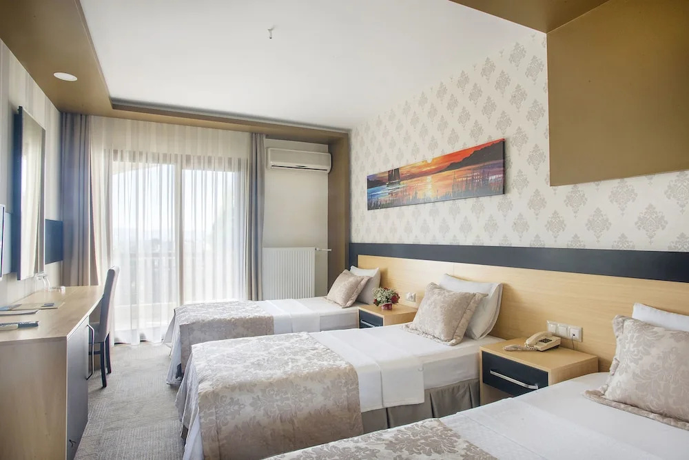 1 Bedroom Standard Triple Family room with balcony and with garden view