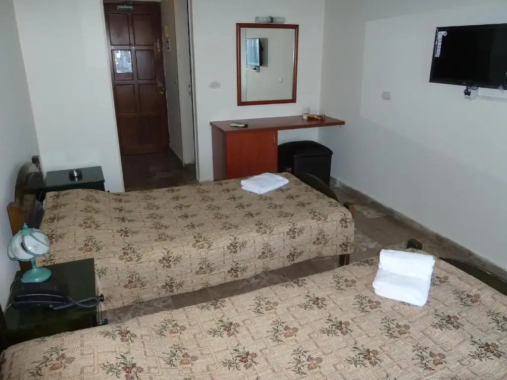 Holiday Suites Hotel And Beach - Chambres