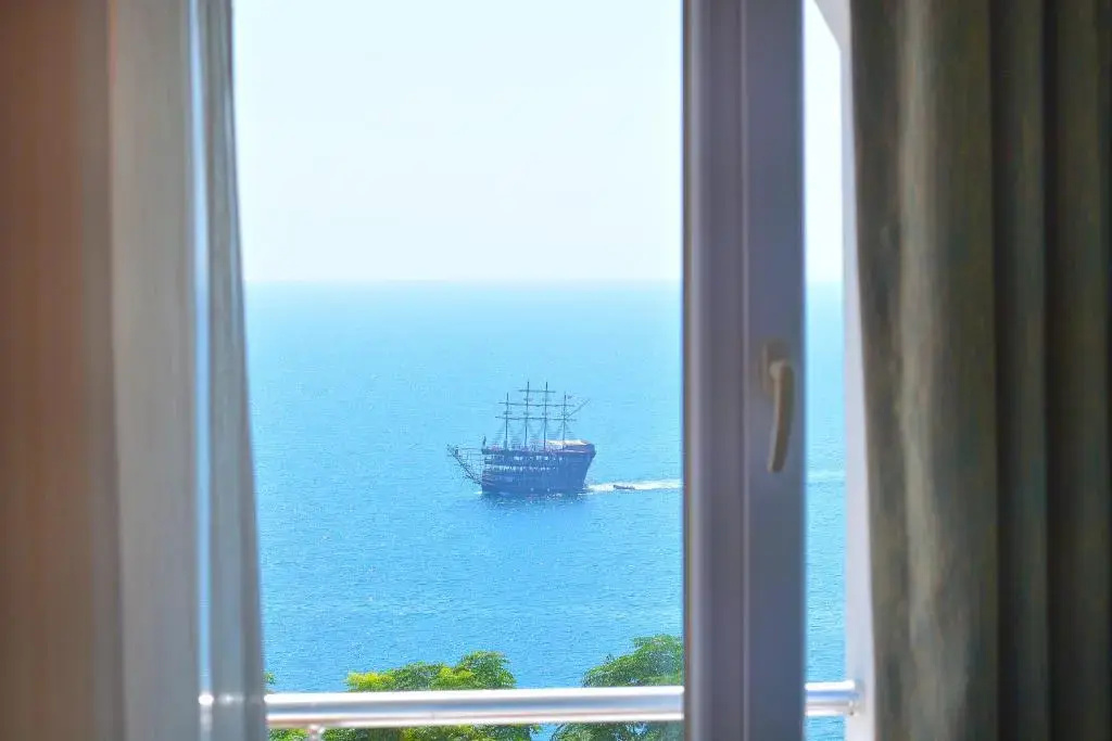 Standard Triple room with sea view