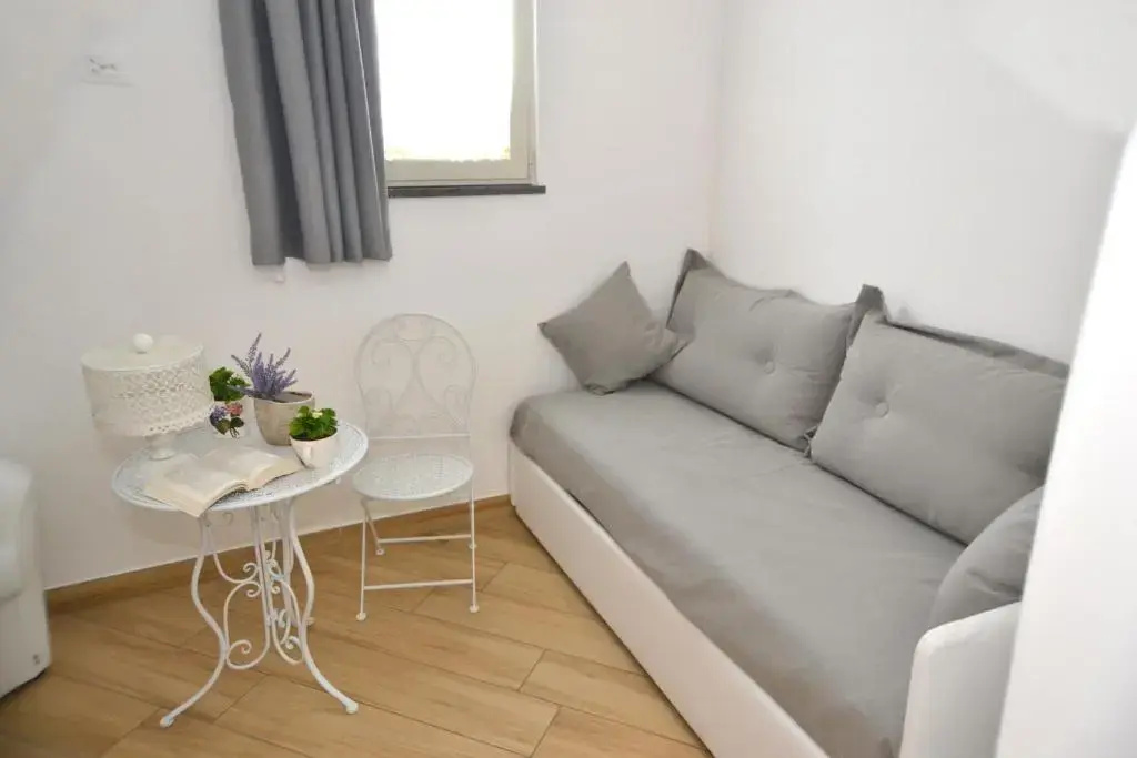 Deluxe Quadruple room with city view