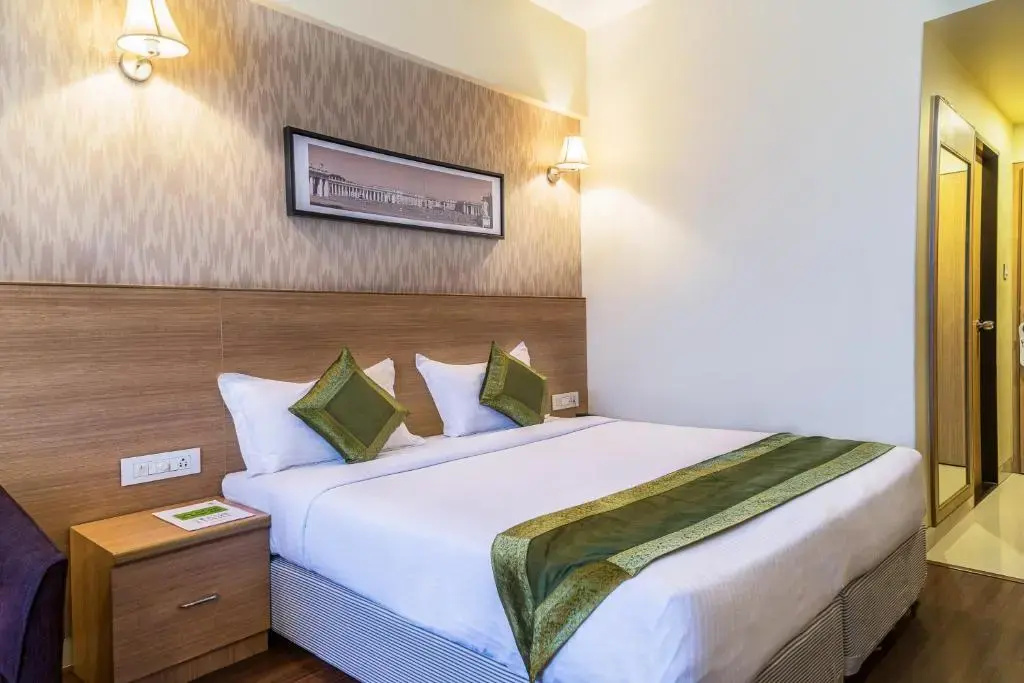 Treebo Premium Grand Emerald - Chambres