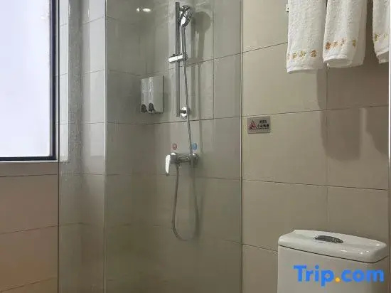 Huajun Hotel - Chambres
