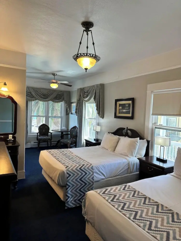 Standard Quadruple Family room with partial ocean view