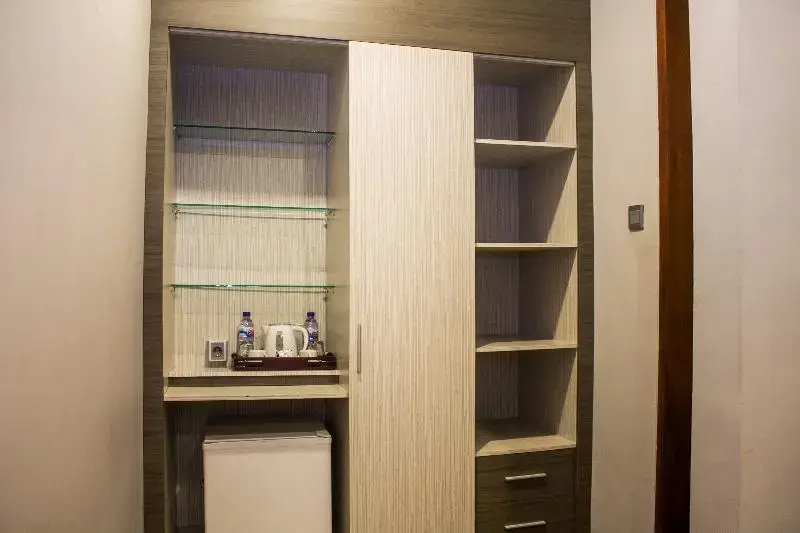 Kamini Legian Hotel - Chambres