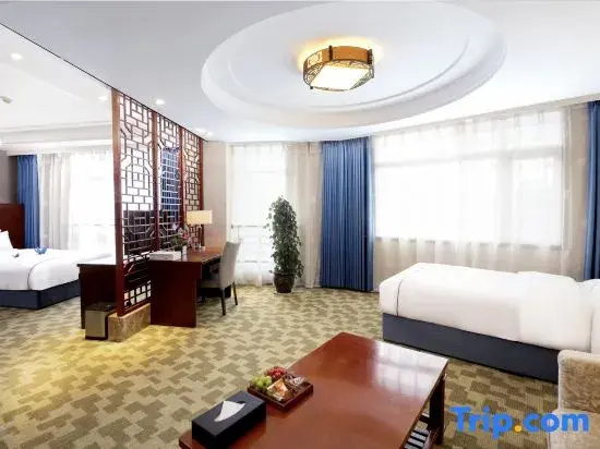 Harmonious Dunpu Hotel - Chambres