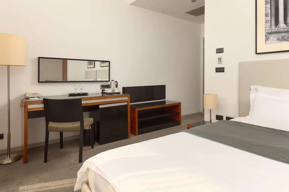 Atrium Hotel - Chambres