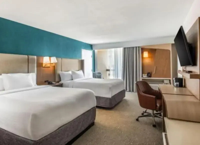 Standard Quadruple room with balcony and with pool view