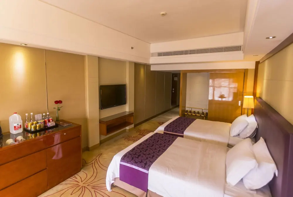Manhattan Kinlen Hotel - Shishi - Chambres