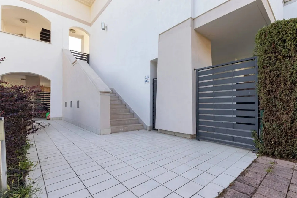 Pool-view Flat With Fenced Garden
