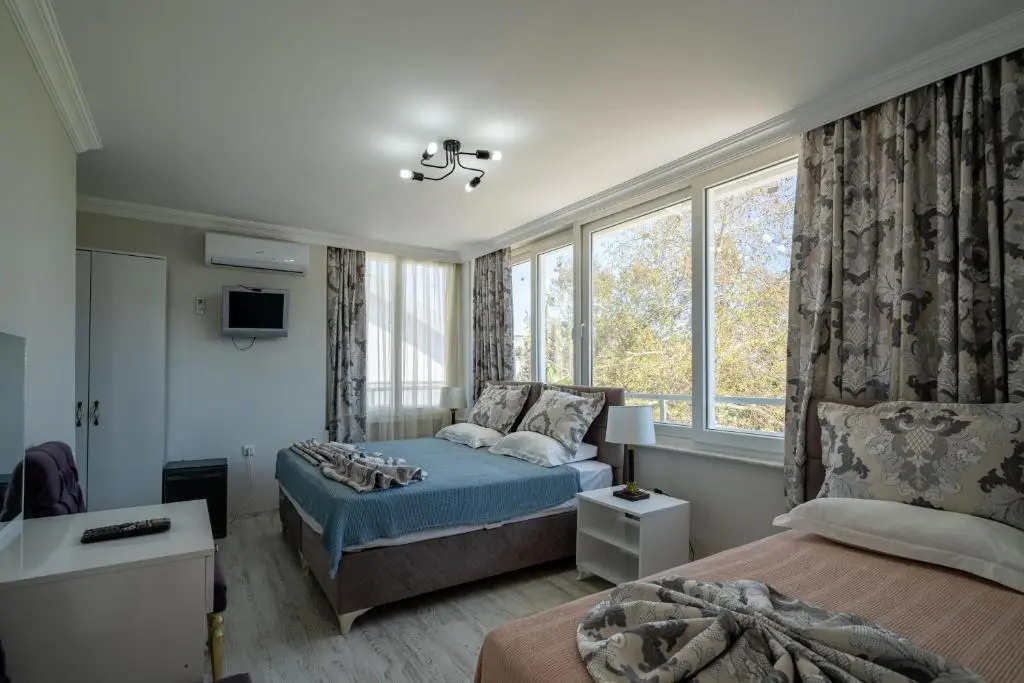 Standard Triple room with sea view