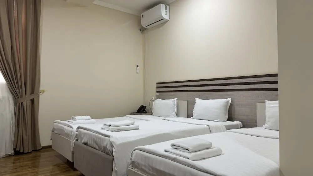 Standard Triple room with balcony