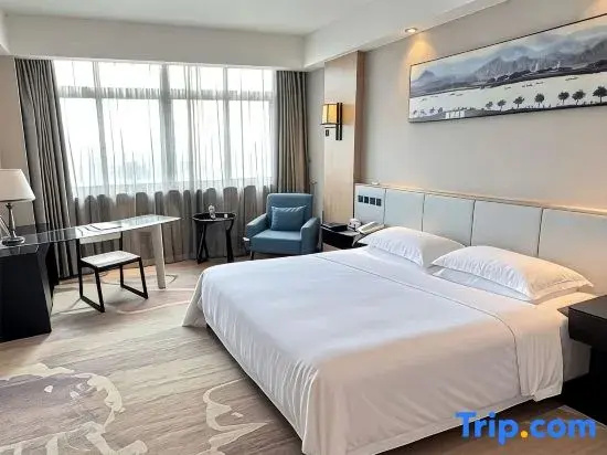 Sanyou International Hotel - Chambres