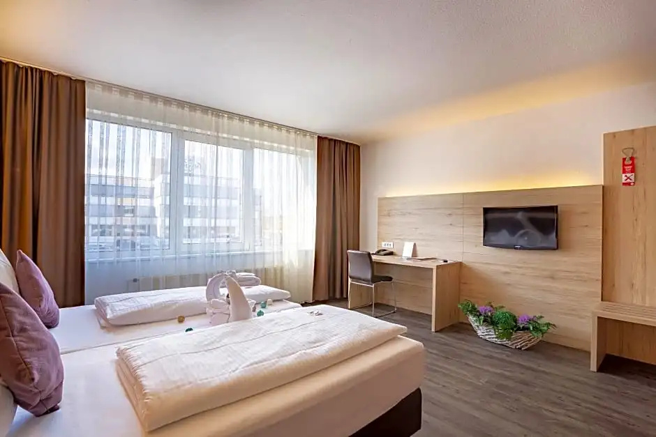Michel Hotel Frankfurt-Airport Ruesselsheim - Chambres
