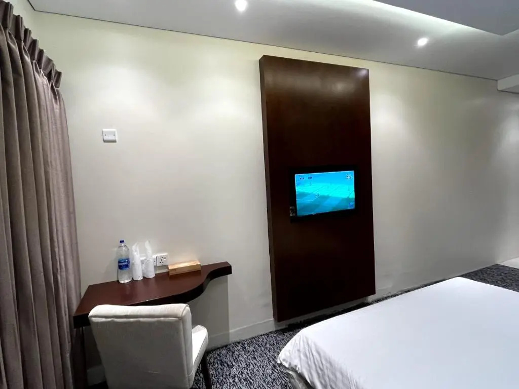 Richmond Hotel & Apartments - Chambres