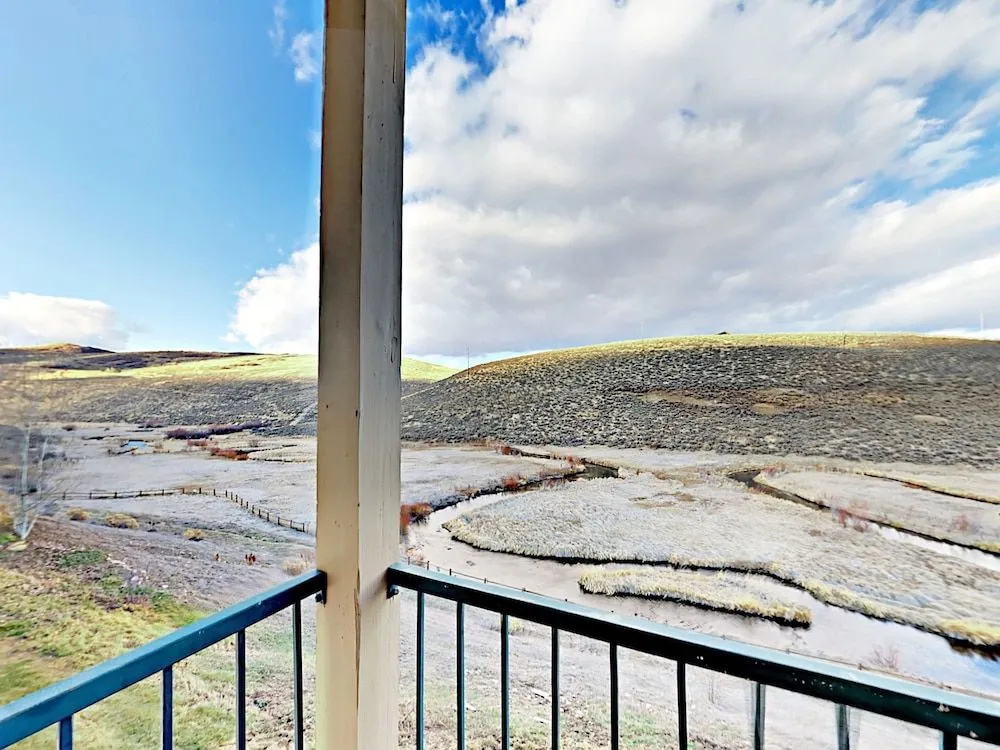 Stream and Mountain Views at Canyon Creek by RedAwning